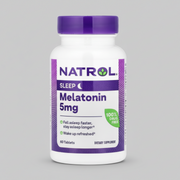 Natrol Melatonin 5mg supplement bottle on a gray background