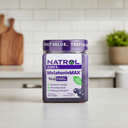 Natrol Melatonin MAX gummy supplement jar with purple lid on a white background