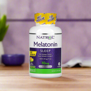 Natrol Melatonin Fast Dissolve 10mg Citrus flavour 100 tablets is placing on top of kitchen table