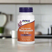 The image of Now Foods Extra Strength Melatonin 10mg placing on top of a table