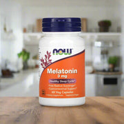 Now Foods Melatonin 3mg is placing on top of a table