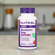 Natrol melatonin fast dissolve 3mg 90tablets is placing on top of kitchen table